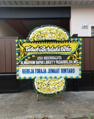 Papan Bunga Duka di Togolobe